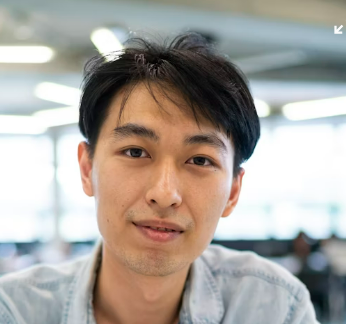 Man smiling indoors