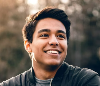 Smiling young man outdoors
